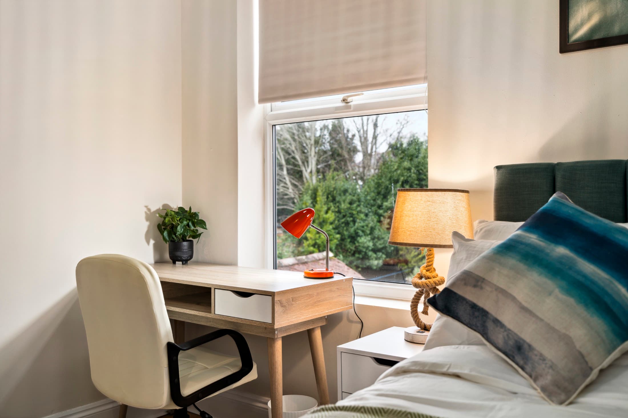 Comfortable bedroom with workspace in Southampton accommodation