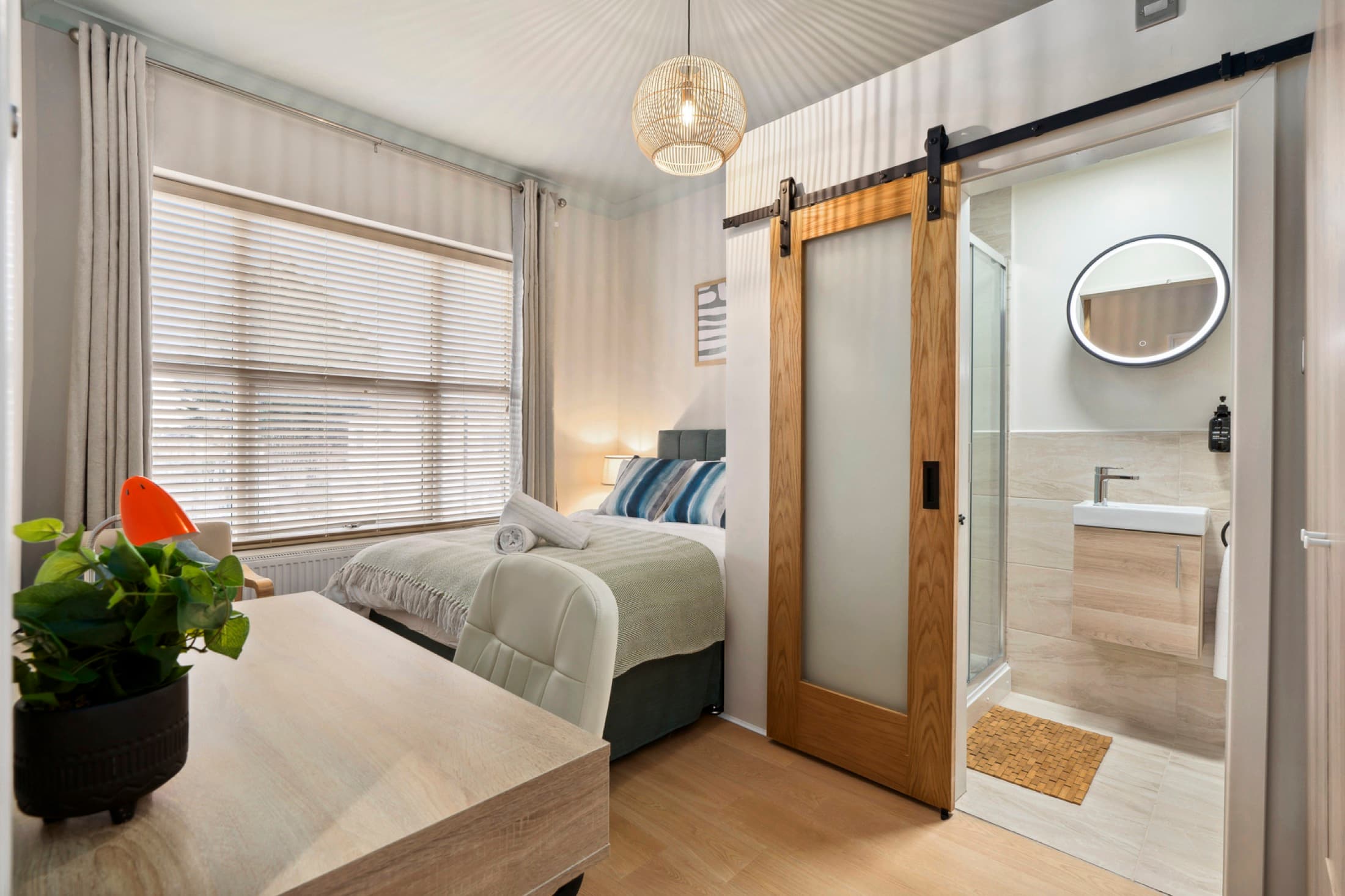 Open-plan communal kitchen and living area at Horizen Haven