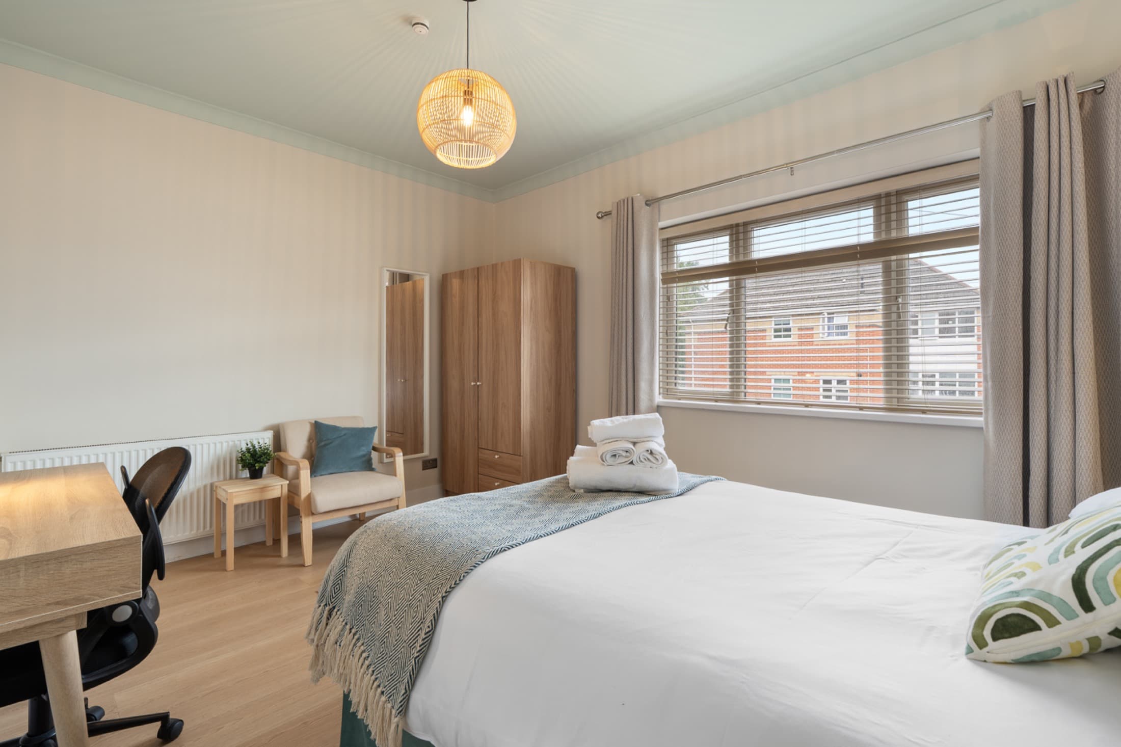 Serviced room with a study area for maritime professionals and other working professionals